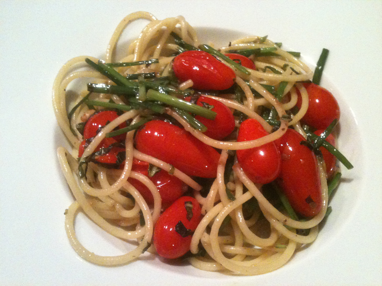 Spaghetti with Sweet 100 Tomatoes, Garlic Chives, and Lemon Basil